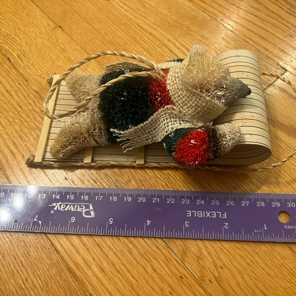 bristle sledding bear Christmas ornament